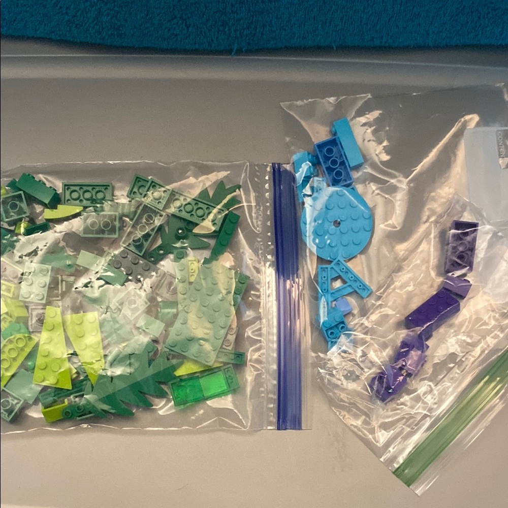 Mixed bag of greens, blues, and purples blocks as is